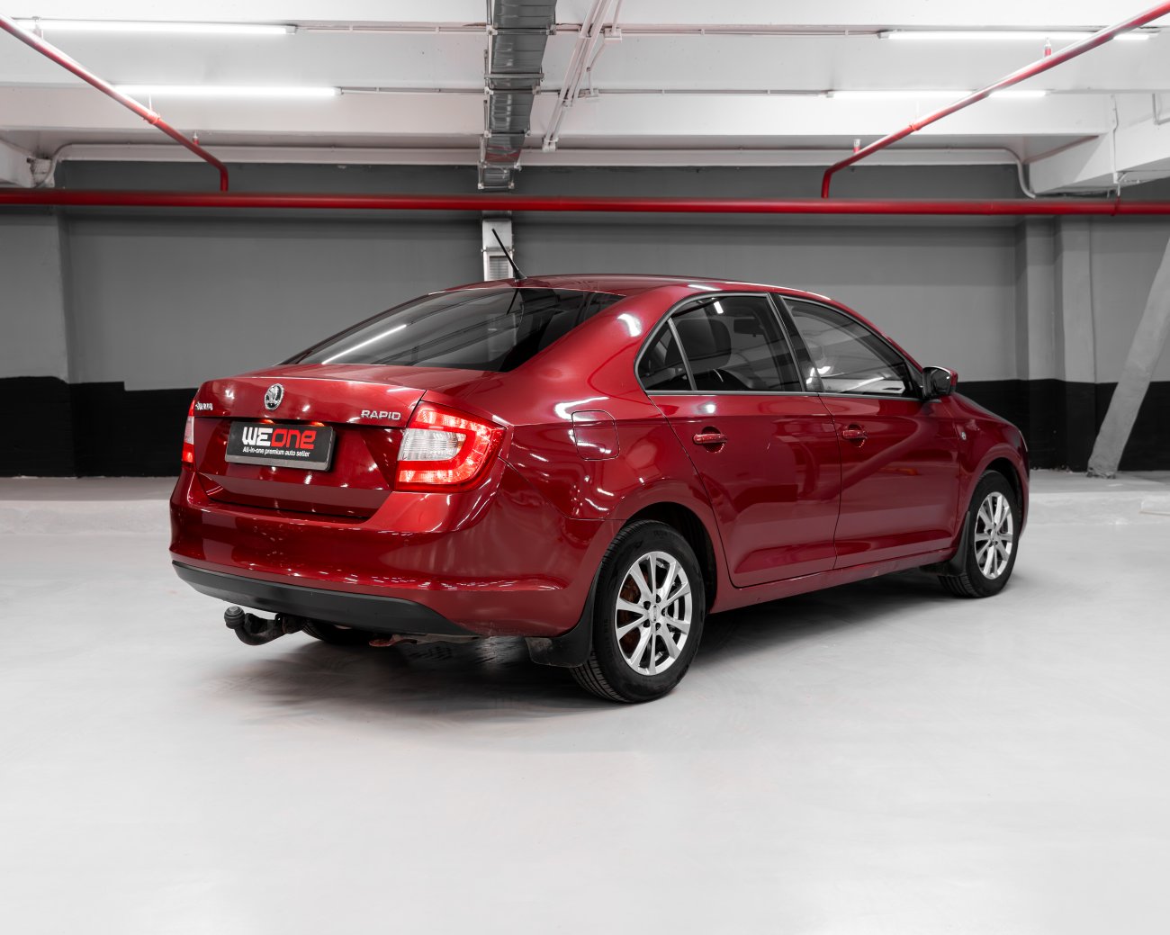 купить Skoda RAPID 2015 вишнево-красный в Москве